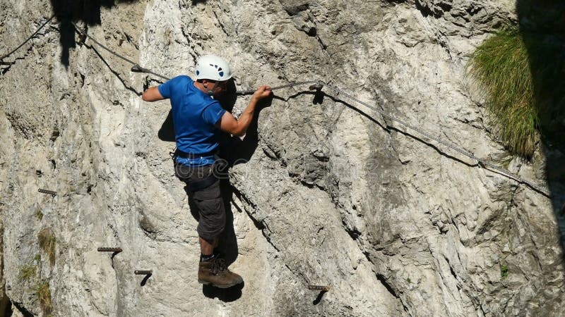 Man climbing climber rock sport extreme mountain.