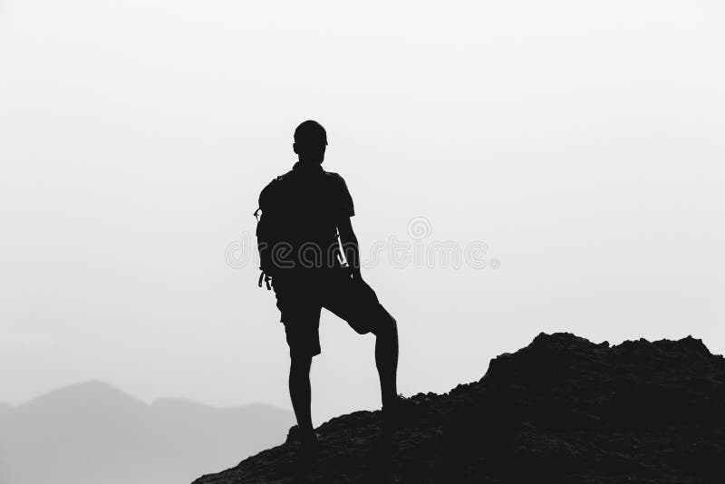 Man climbing hiking inspiration landscape, travel silhouette