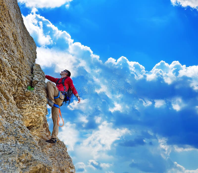 Man climbing on rock stock image. Image of effort, extreme 55104387