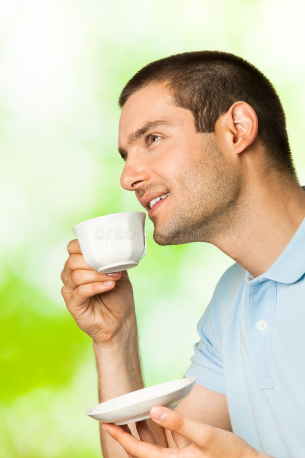 Man with coffee stock image. Image of male, pretty, happy 15196757