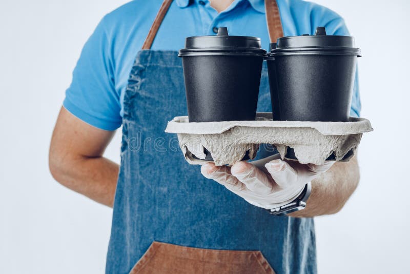 Man Coffee Shop Worker Giving Takeaway Cups of Coffee on Grey ...