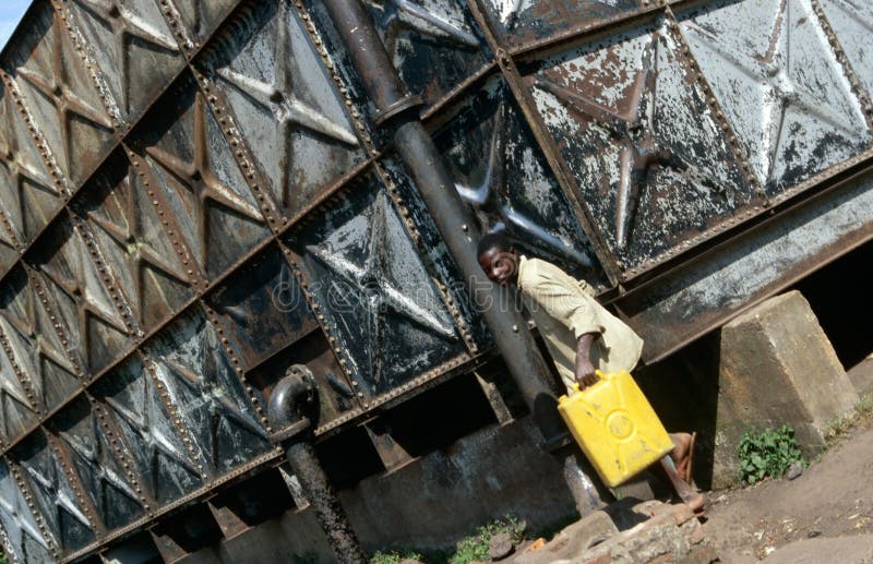 Water supply in Rwanda editorial photo. Image of vertical 25575521