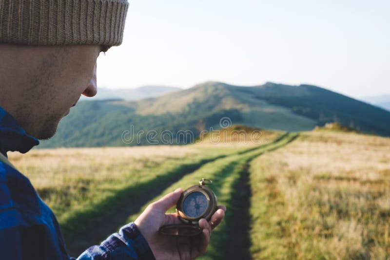 Man with compass in hand