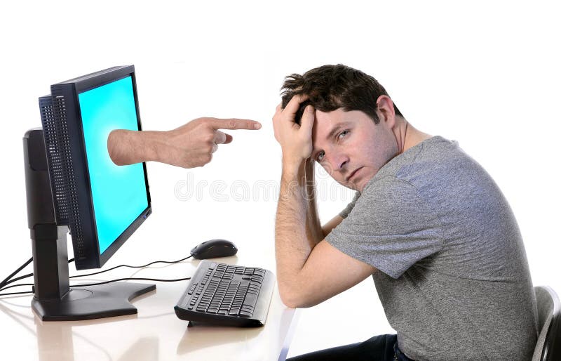Man with computer accusing finger cyberbullying