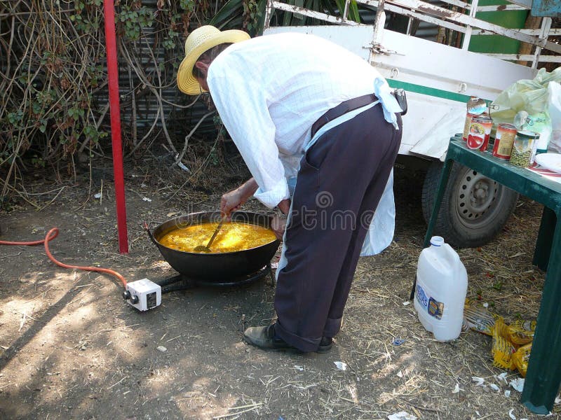 Man Cooking Rice Paste for Rice Noodles, Vietnam Editorial Stock Image