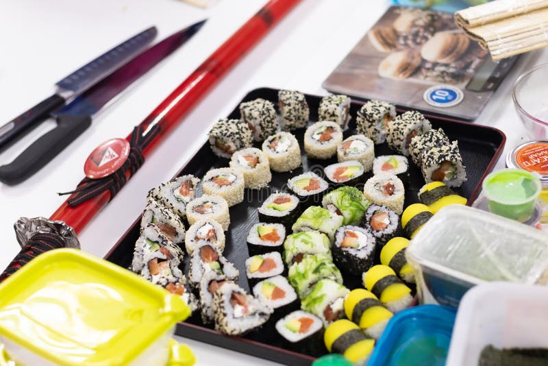 A Man Cooks Sushi,nori Salmon Rice on a Mat Stock Image Image of roll
