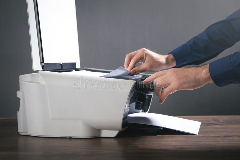 Man Copying and Scanning Documents in Office Stock Image Image of