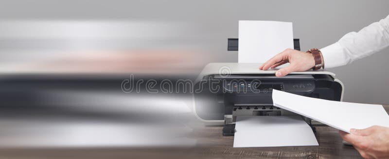 Man copying and scanning documents in office