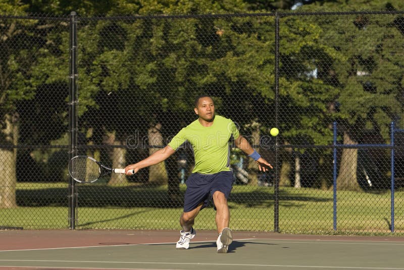 Man on Court Playing Tennis