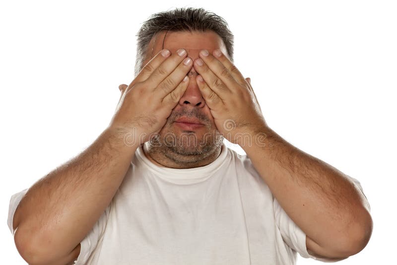 Man covering his eyes stock photo. Image of face, person 87077628