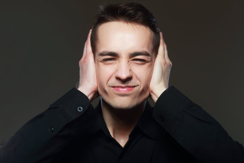 Man Covers His Ears With His Hands Stock Photo Image of pose, closes