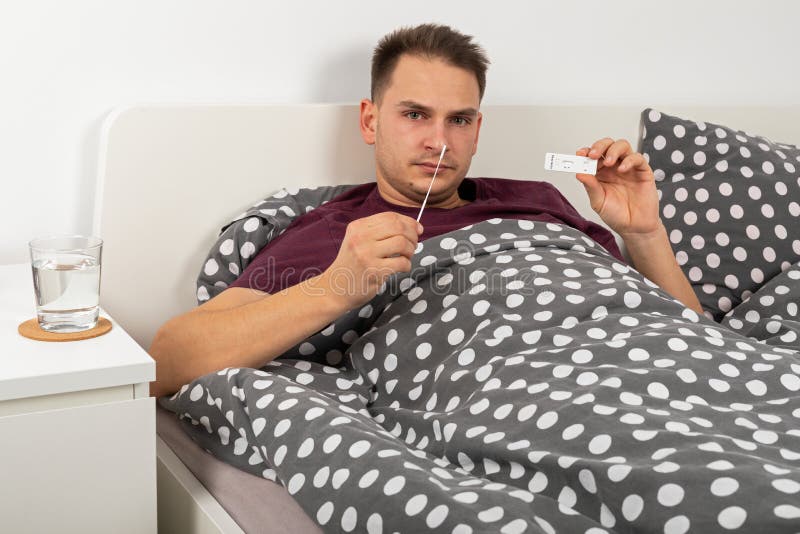 Man with Covid Symptoms in Bed Stock Photo Image of medical, illness