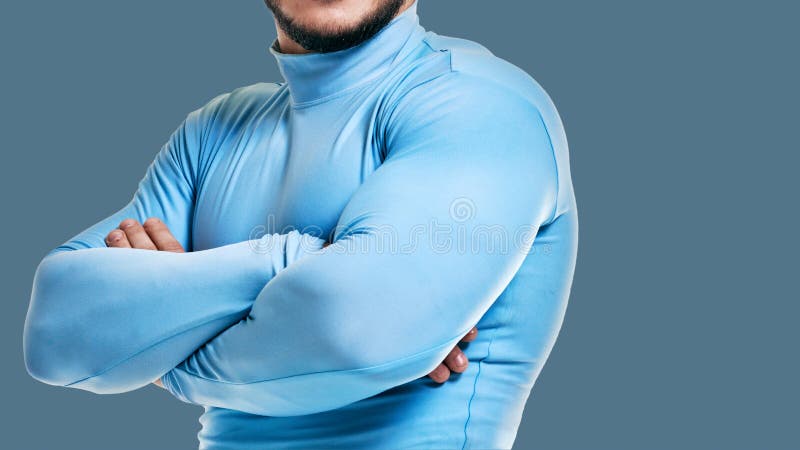 Bodybuilder crossing hands stock photo