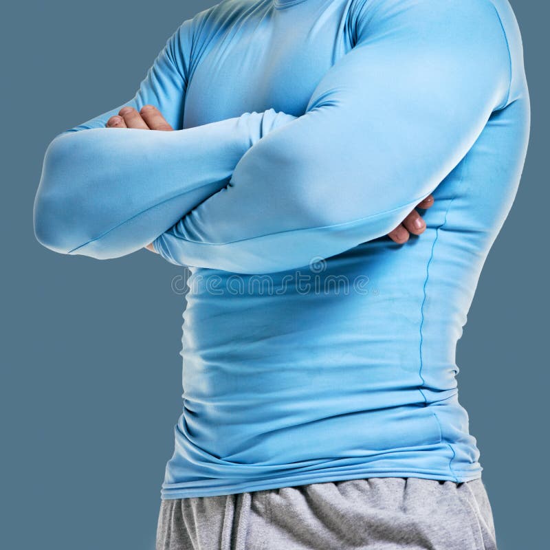 Bodybuilder crossing hands royalty free stock photo