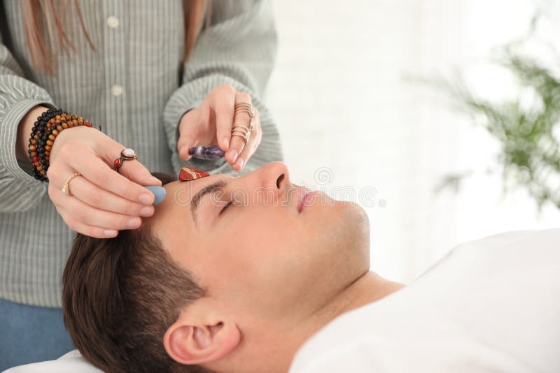 Man during Crystal Healing Session in Room Stock Image Image of adult