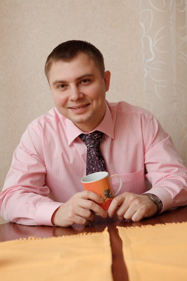 Man with a cup of tea stock image. Image of young, person 13537523