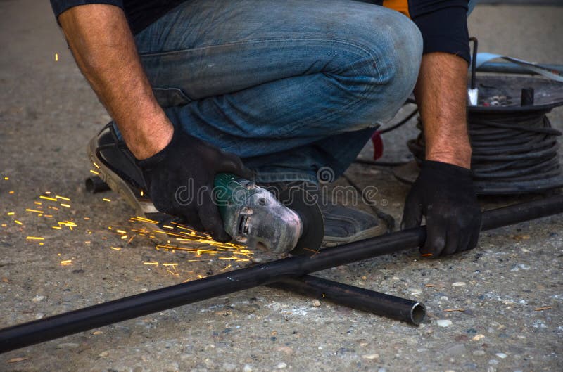 Man Cutting a Gas Pipe for Central Gas Installation Stock Image Image