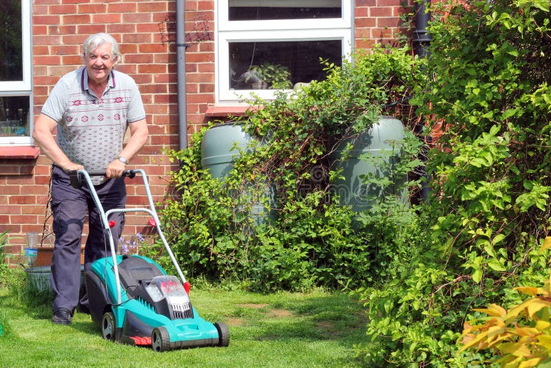 Man mowing the lawn. stock image. Image of happy, summer 31910231
