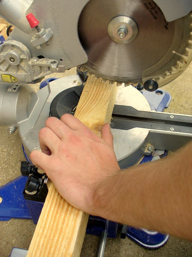 Man cutting wood stock image. Image of risk, caucasian 20388877
