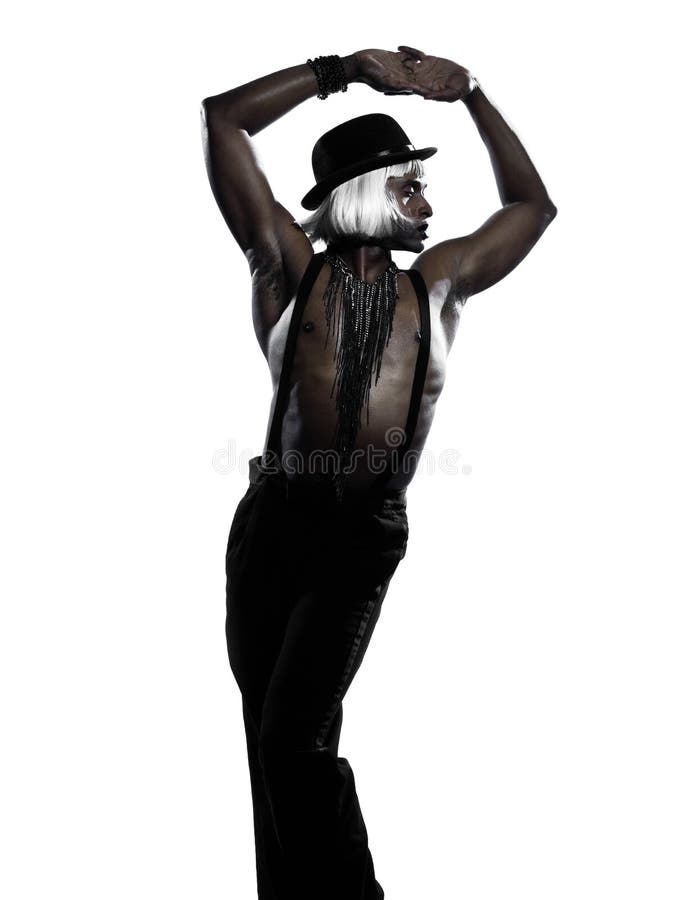 One african man dancer dancing cabaret burlesque on studio isolated white background