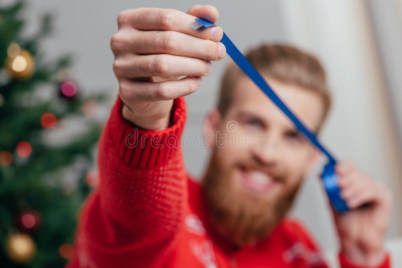 Man with Decorative Blue Ribbon Stock Image Image of people