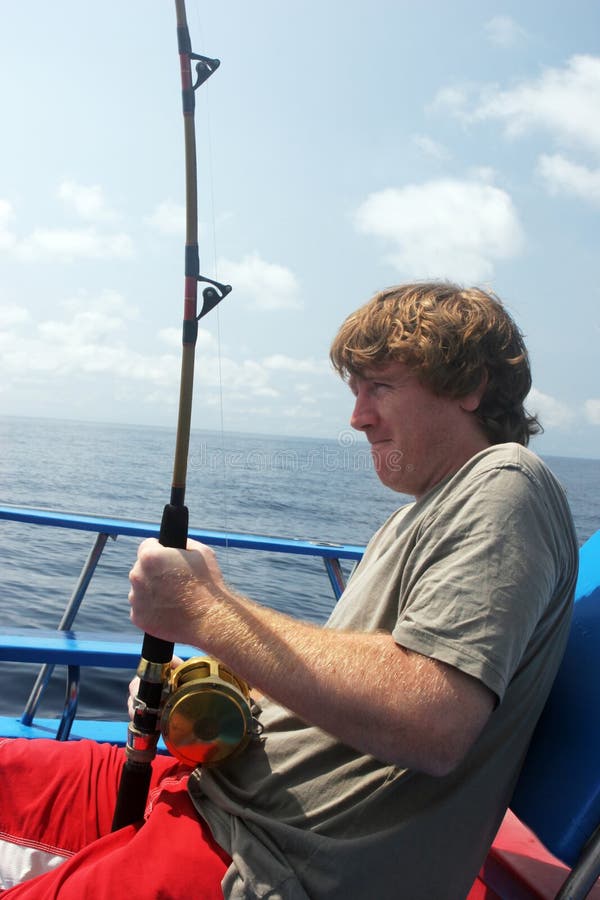 Man deep sea fishing