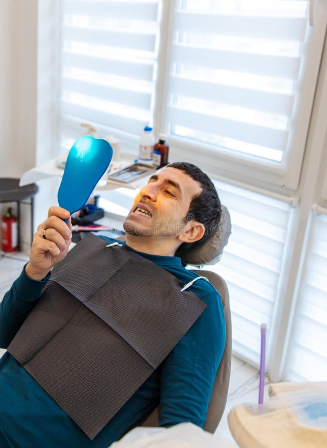 A man at a dentist appointment. Selective focus. royalty free stock photos