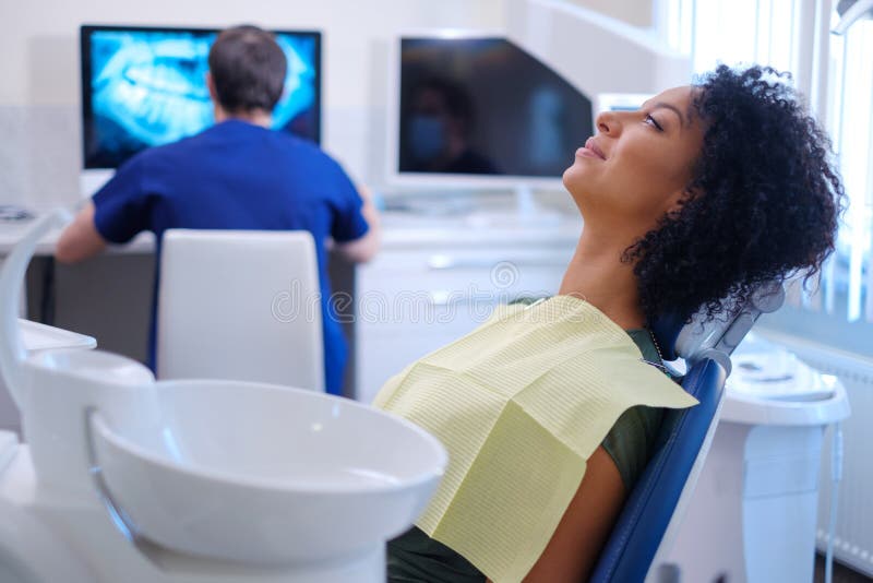 Man dentist works on a x-ray stock image Man dentist works on a x-ray stock image