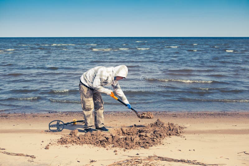 Man Digging A Hole On The Beach Stock Image Image Of Adventure