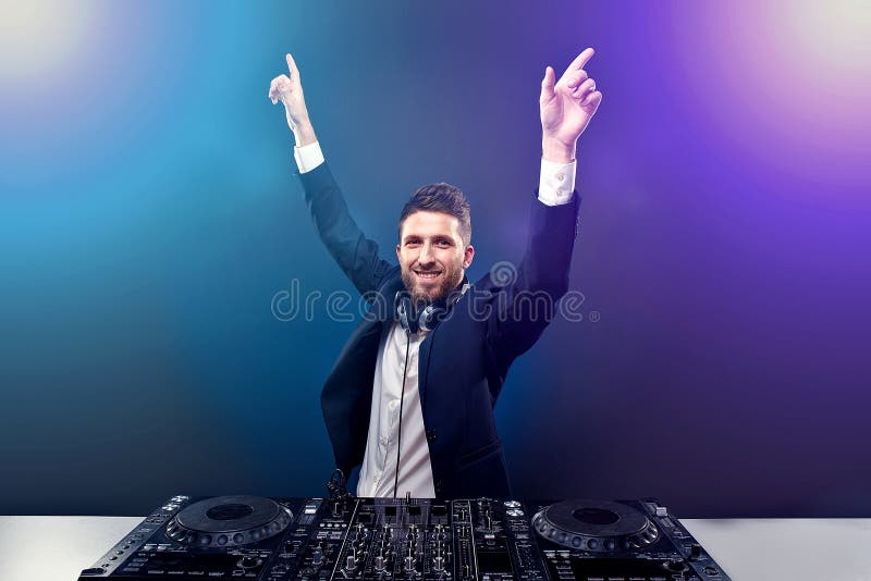 Man DJ in Dark Suit Play Music on a Dj`s Mixer. Studio Shot Stock Photo - of expression, entertainment: 198107838