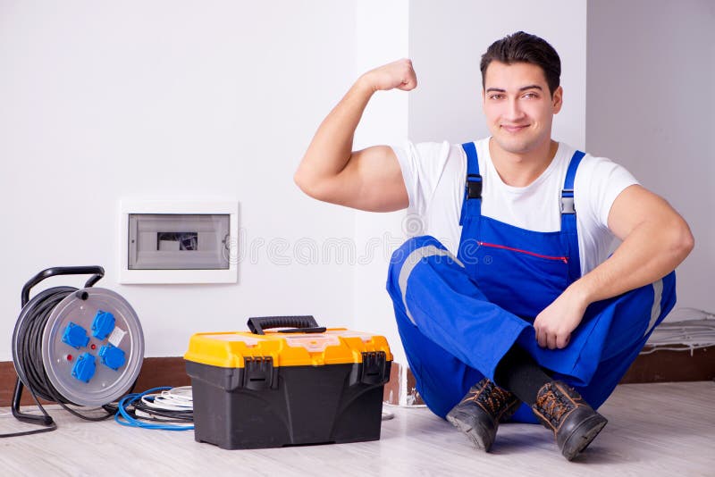 The man doing electrical repairs at home