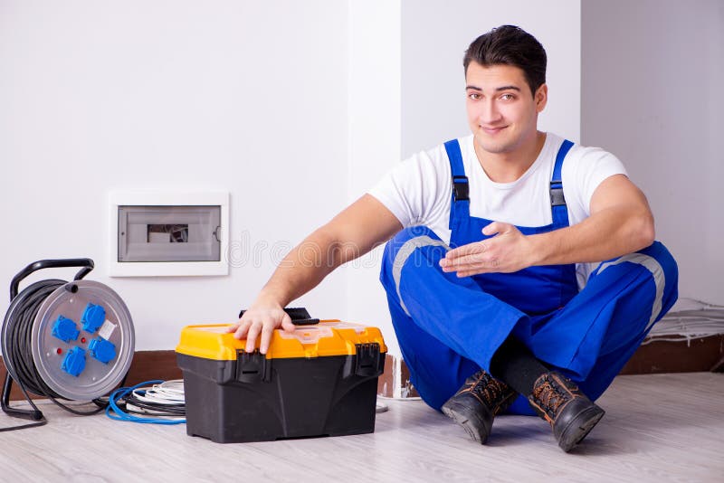 The man doing electrical repairs at home