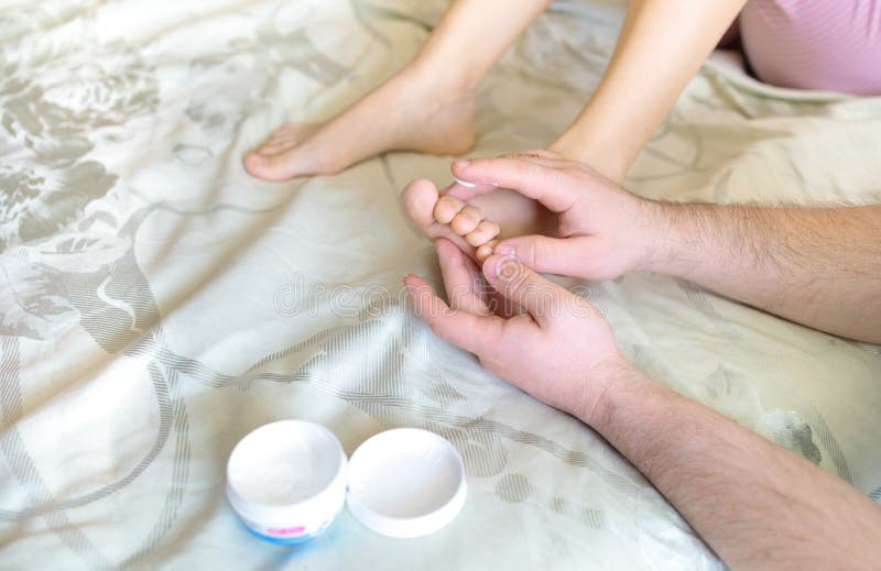 A Man Doing A Foot Massage To His Wife Stock Image Image Of Barefoot Lifestyle 216621253 