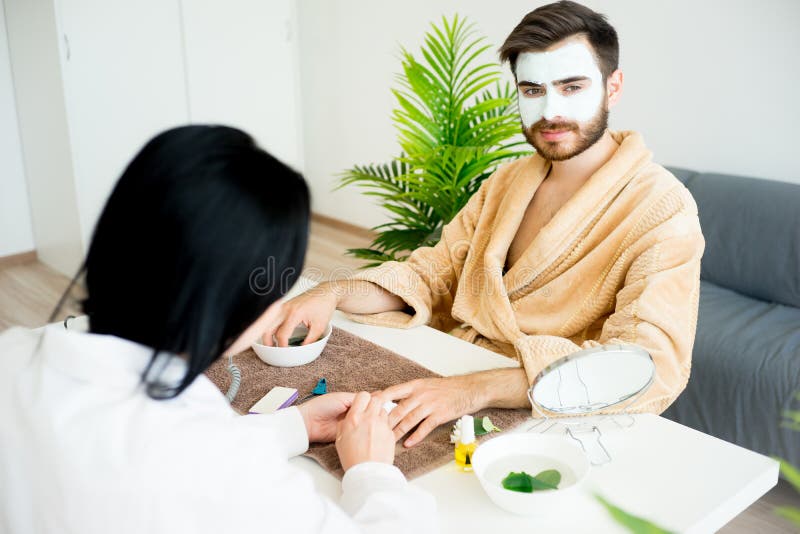 Man doing manicure stock photo. Image of beautician, beautiful 96380034