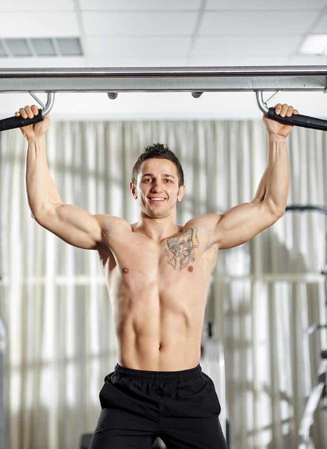 Man doing pullups stock photo. Image of exercise, bodybuilder 48603012