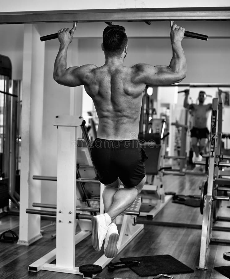 Man doing pullups stock photo. Image of back, male 155749472