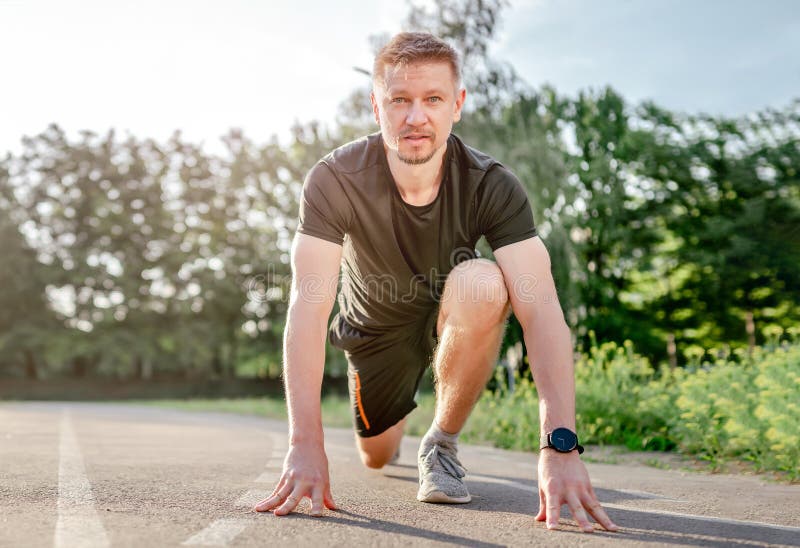 Man doing workout outdoors stock photo. Image of sportswear - 245093358