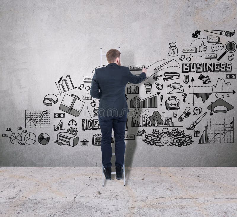 Man Drawing a Business Plan on a Concrete Wall Stock Photo Image of