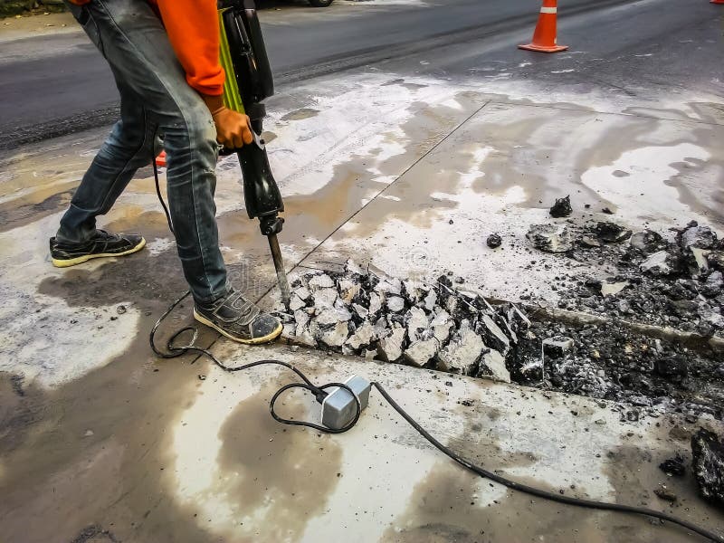 Man drilling road stock photo. Image of jackhammer, work 52814036