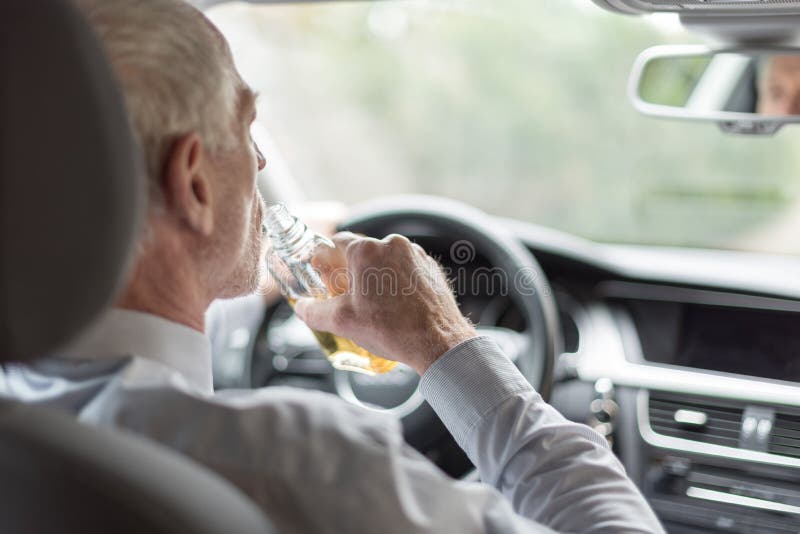 Man Drinking Alcohol and Driving Stock Photo Image of vehicle
