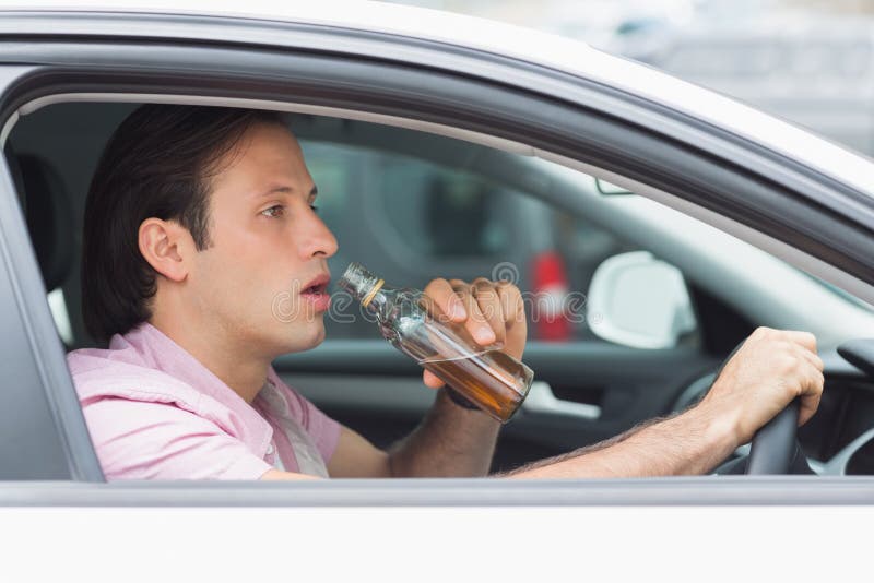 Man Drinking Alcohol while Driving Stock Image Image of dangerous
