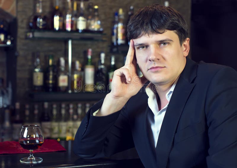 Man drinking brandy stock photo. Image of people, eyes 45023380