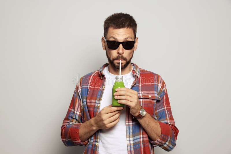 Man Drinking Delicious Juice on Grey Background Stock Photo Image of natural, drinking 260039408