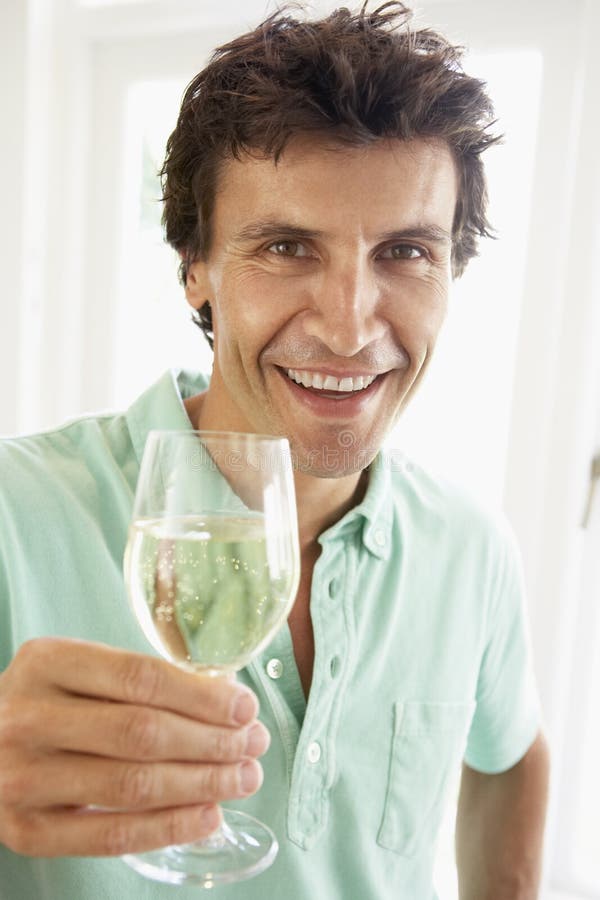 Man Drinking a Glass of White Wine Stock Image Image of smiling