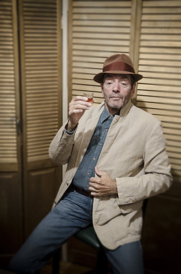 Man Drinking from Shot Glass_1 Stock Image Image of distraught, alone