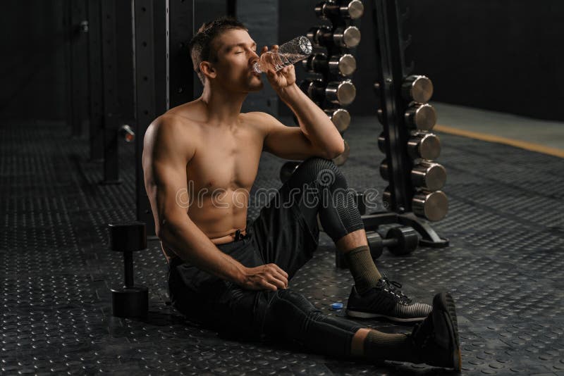 Man drinking water after hard training royalty free stock images Man drinking water after hard training royalty free stock images