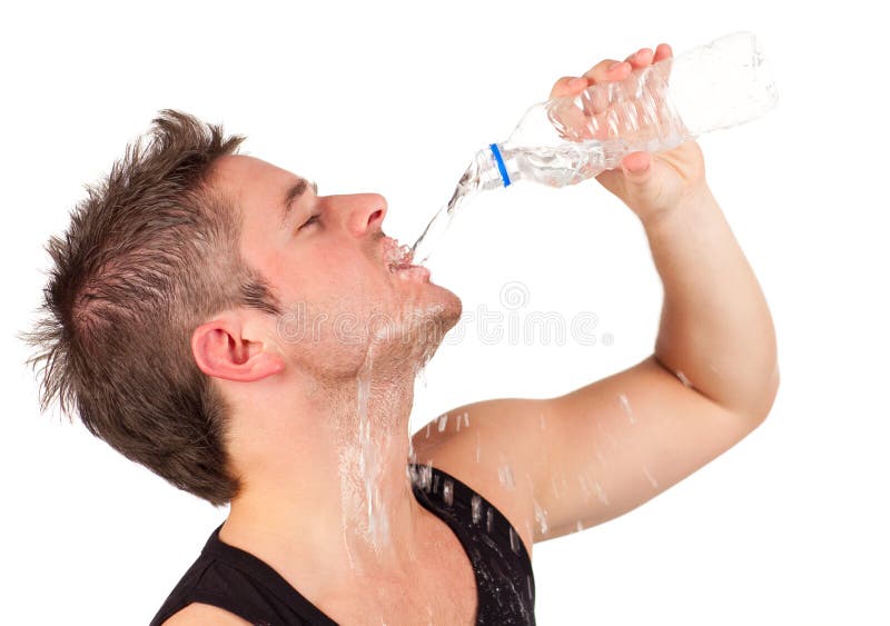 Man drinking water after workout in the gym