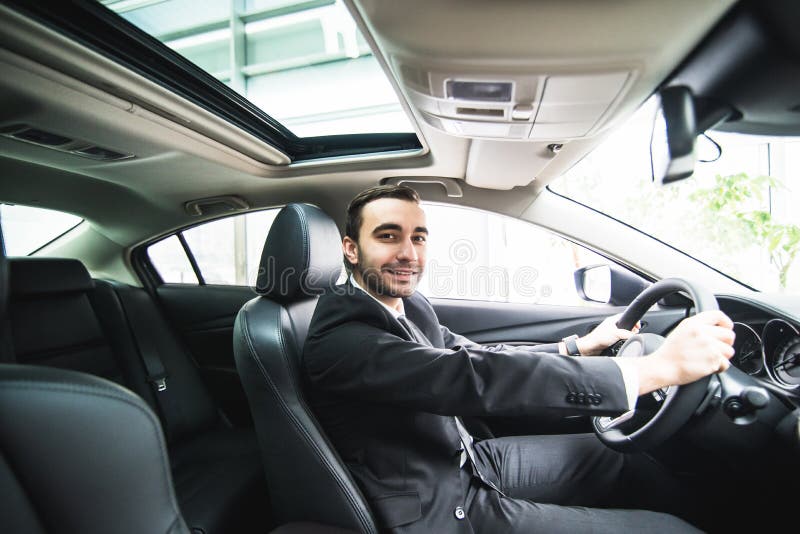 Man Driving Car and Look at Pasanger Place Stock Image Image of
