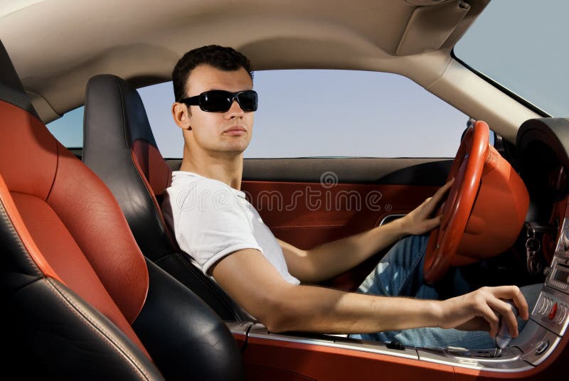 Man driving modern sport car