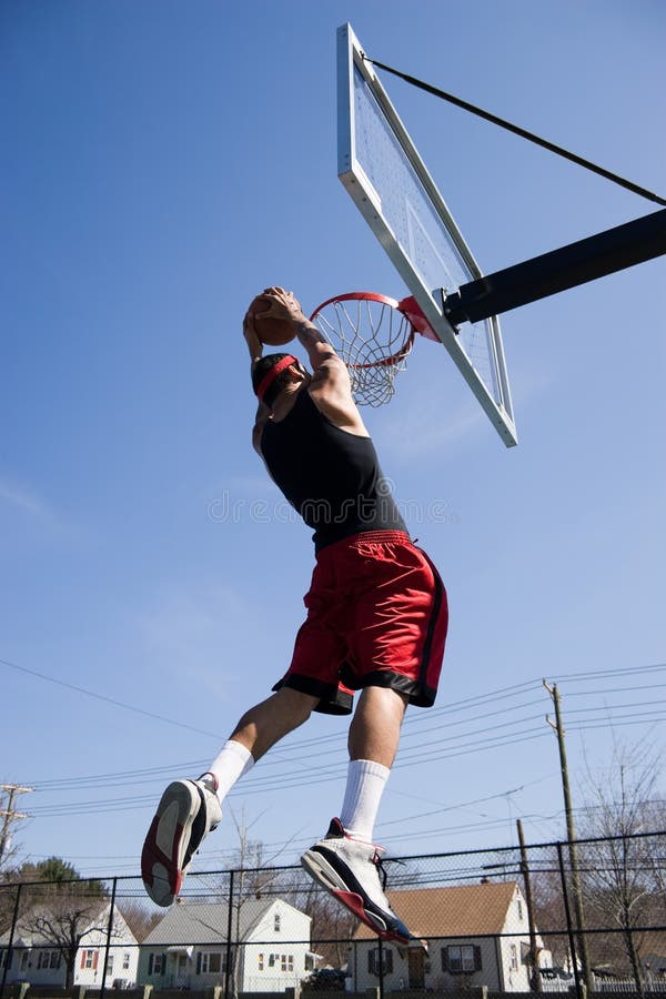 Man Dunking the Basketball stock photo. Image of ball 10103192
